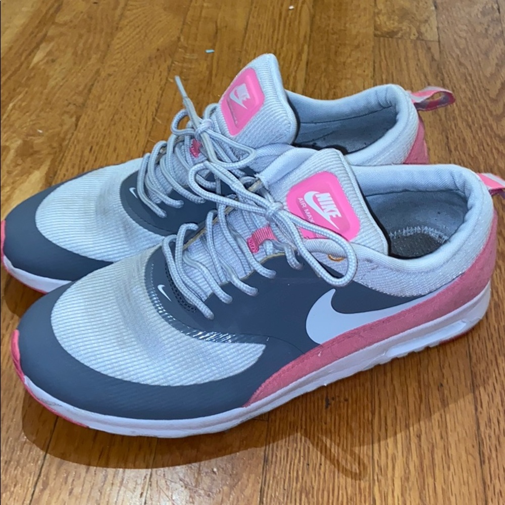 Gray/ pink sneakers.